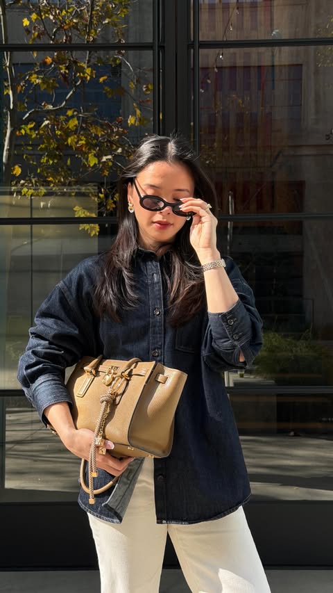 Instagram post by @callherclassy for Michael Kors. Caption reads: [...] elevated to fit into my real life.....