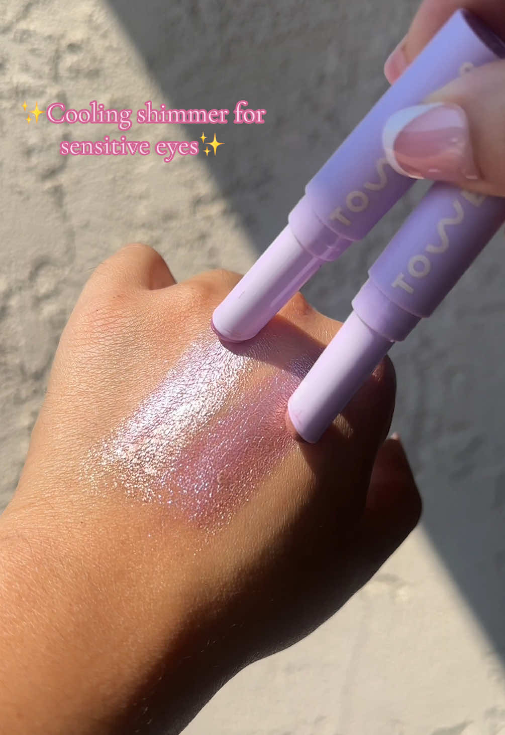 TikTok post by @julesbbeauty for Tower 28 Beauty. Caption reads: Tower 28 Beauty’s new Cooling shimmer [...].