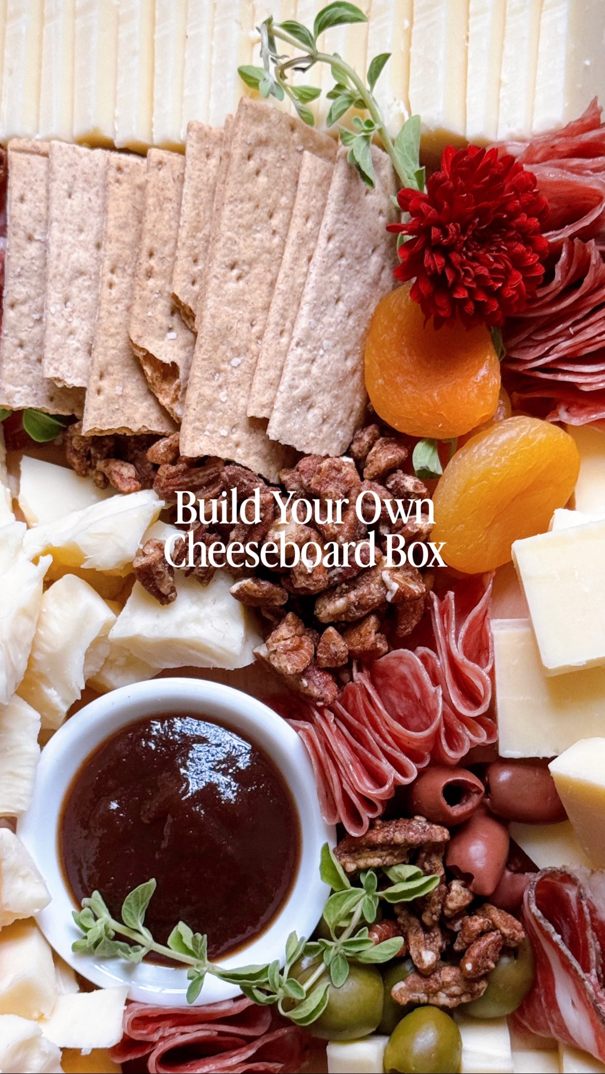 Instagram post by @thatcheeseplate for Cabot Creamery Cooperative. Caption reads: BUILD YOUR OWN CHEESEBOARD BOX with....