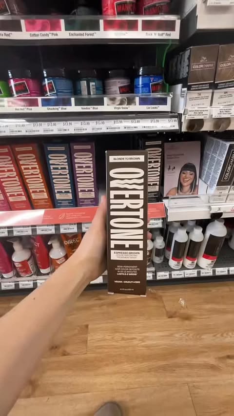 Instagram post by @mamaruppert for oVertone. Caption reads: Touch up my hair with me using @overtonecolor 🤎....