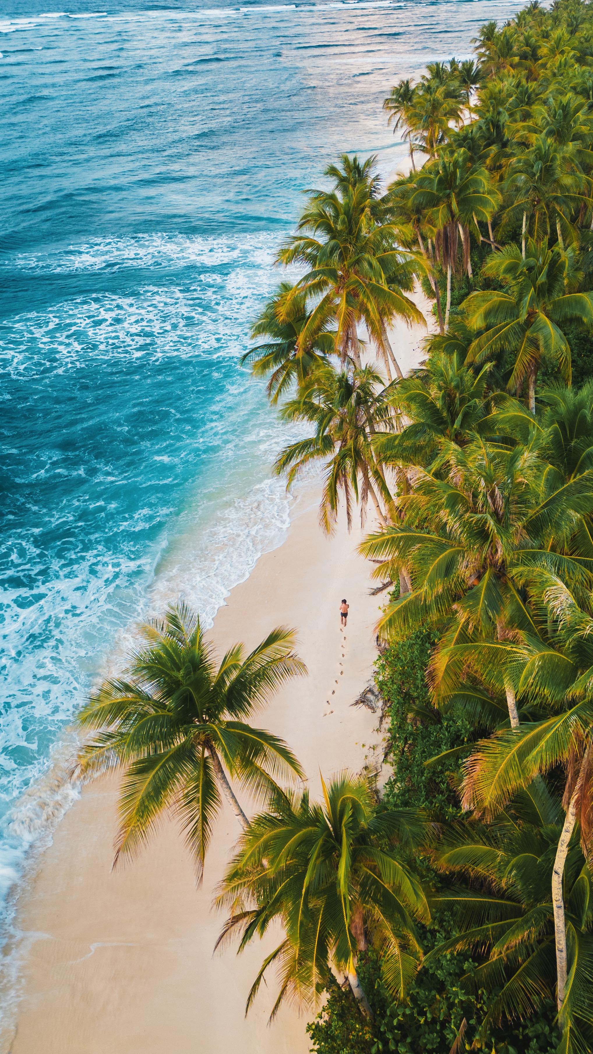 Instagram post by @nicko.stark for National Geographic Travel. Caption reads: Siargao Island break 🏝️

Book your next trip via....