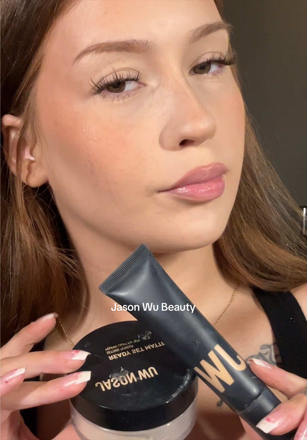 TikTok post by @lizzie.mcclainn for JASON WU BEAUTY. Caption reads: My current obsession 😍 @Jason Wu Beauty setting....