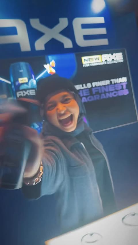 Instagram post by @ndyrsli for AXE. Caption reads: [...] New routine, new energy ✨ Switch to the AXE....