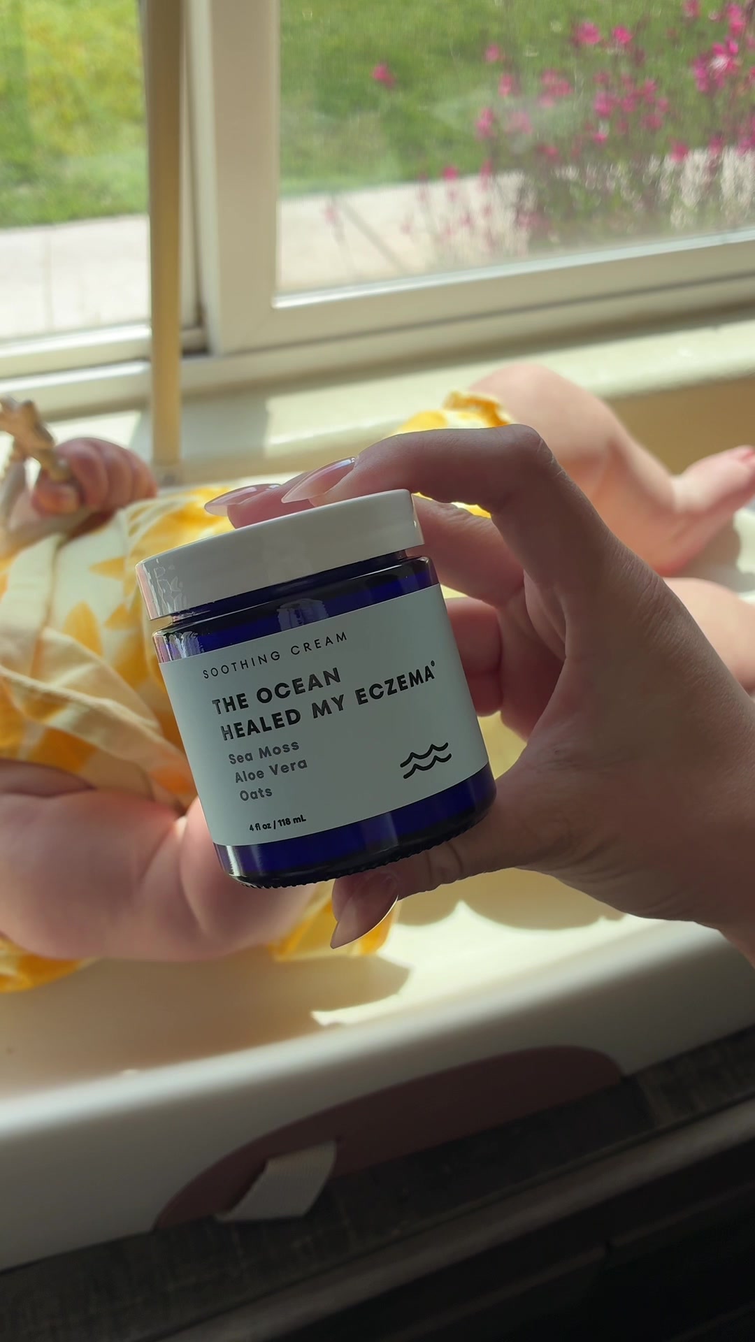 TikTok post by @lifewithkyliie for Healed By The Ocean. Caption reads: [...] my baby's eczema... until this @Healed By....