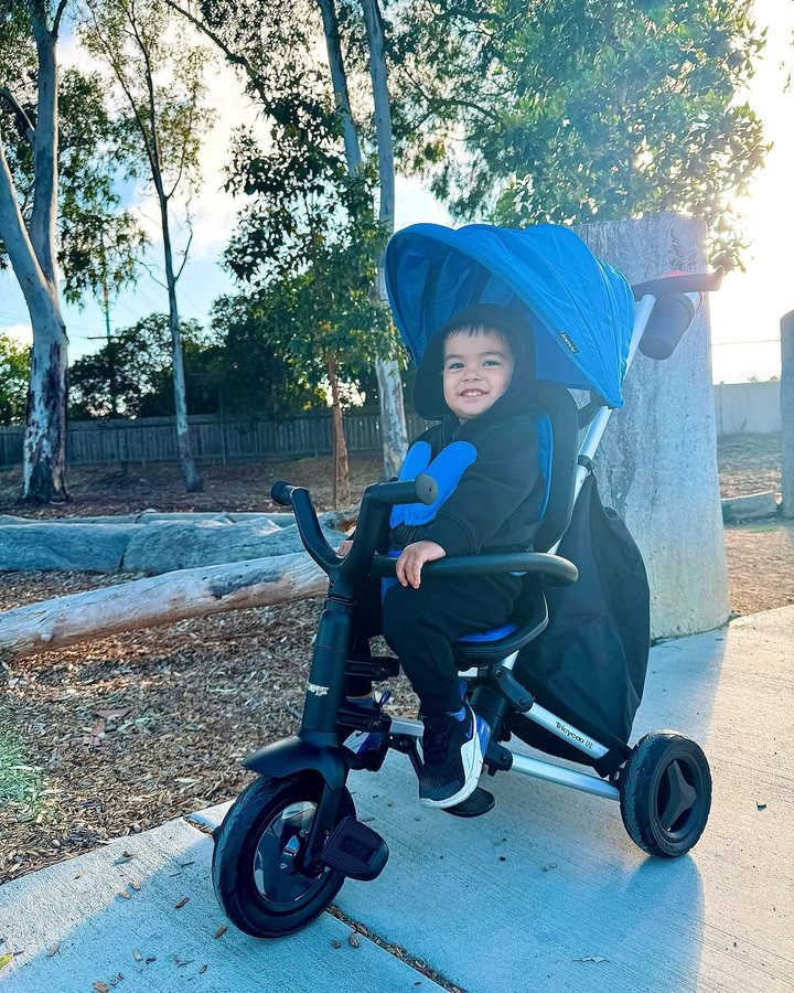 Instagram post by @mamajazmin.c for Joovy. Caption reads: [...] 🚲 😍 He is loving his Tricycoo UL from....