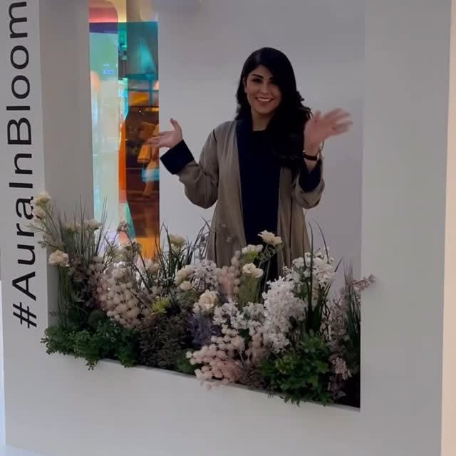 Instagram post by @zaara_albalushi for AURA. Caption reads: #aurainbloom @auraliving  قطع جميلة و مميزة وانيقة....