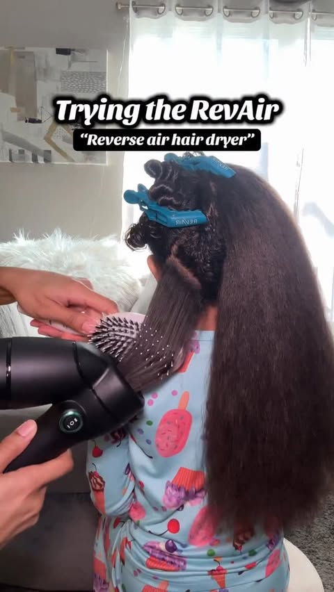 Instagram post by @legacyandmommy for RevAir • Reverse-Air Dryer. Caption reads: Using the RevAir on my daughters hair for the....
