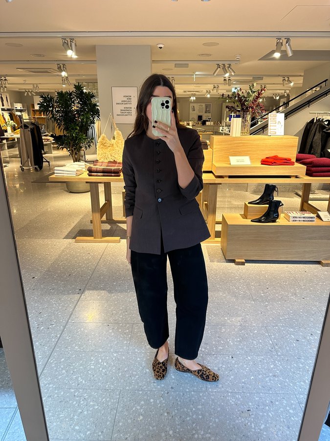 Instagram post by @theannaedit for ARKET. Caption reads: Just a girl who loves to yap, doing what she does....