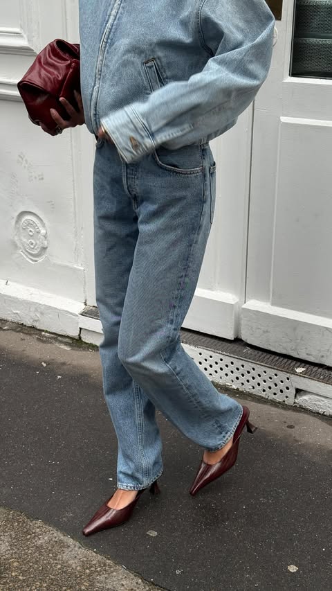 Instagram post by @elisasgn for AGOLDE. Caption reads: these @agolde Lana jeans are becoming my new....