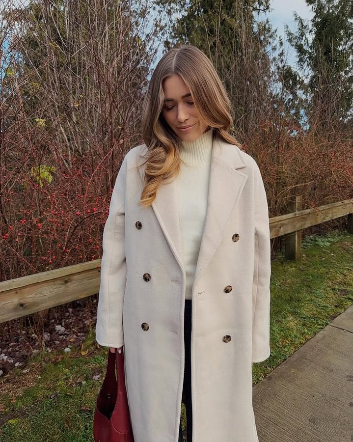 Instagram post by @mykenna for RW&CO.. Caption reads: coat season ☁️🤍✨ @rw_co 
.
#winteroutfits....