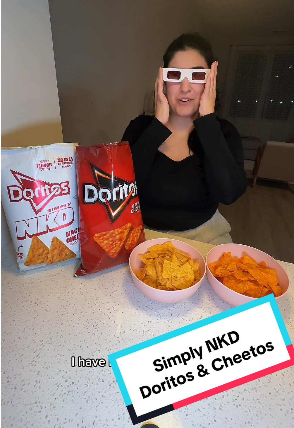 TikTok post by @wandering_with_mariam for Cheetos. Caption reads: #ad @Chester Cheetah & @Doritos just dropped their....