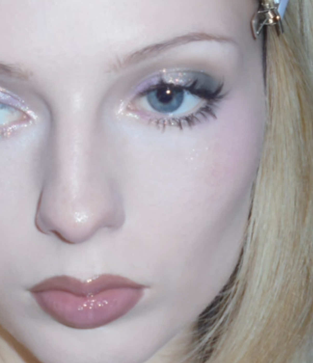 TikTok post by @anniegrace_makeup for Noiricorn. Caption reads: grunge fairy using the @NOIRICORN candy puppet....