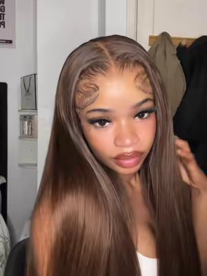 TikTok post by @favour.mb for Sterly Hair. Caption reads: [...] wig | code: 𝐓𝐓𝟑𝟎 for 30% OFF🤎....