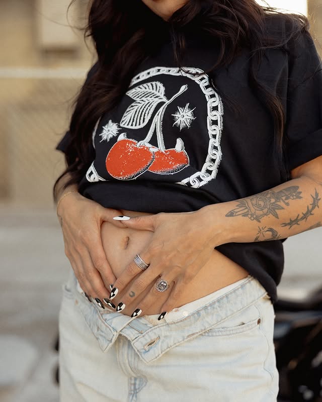 Instagram post by @jessicahaggett for Hell Babes. Caption reads: The @hellbabes x @clocksandcolourswomens collab is....