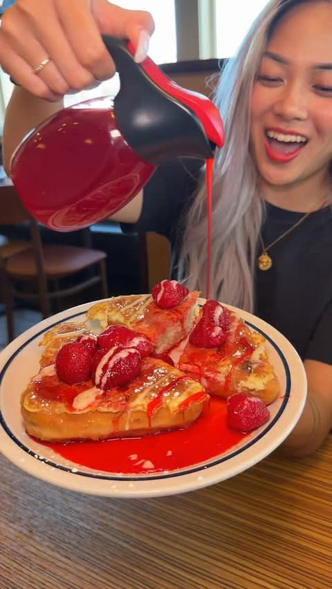Instagram post by @aglassofsherry for IHOP. Caption reads: PSA @IHOP just brought back their Stuffed French....