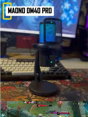 TikTok post by @hanifperdana_ for Maono. Caption reads: Mikrofon Maono DM40 Pro AI Voice Changer. Mikrofon....