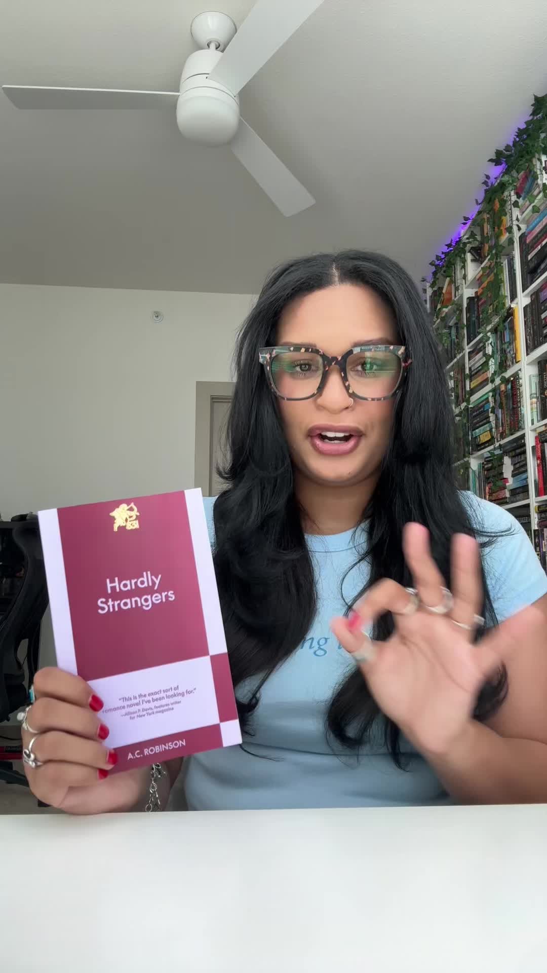 TikTok post by @jolie_reads for 831 Stories. Caption reads: [...] #HardlyStrangers #ACRobinson #831stories ....