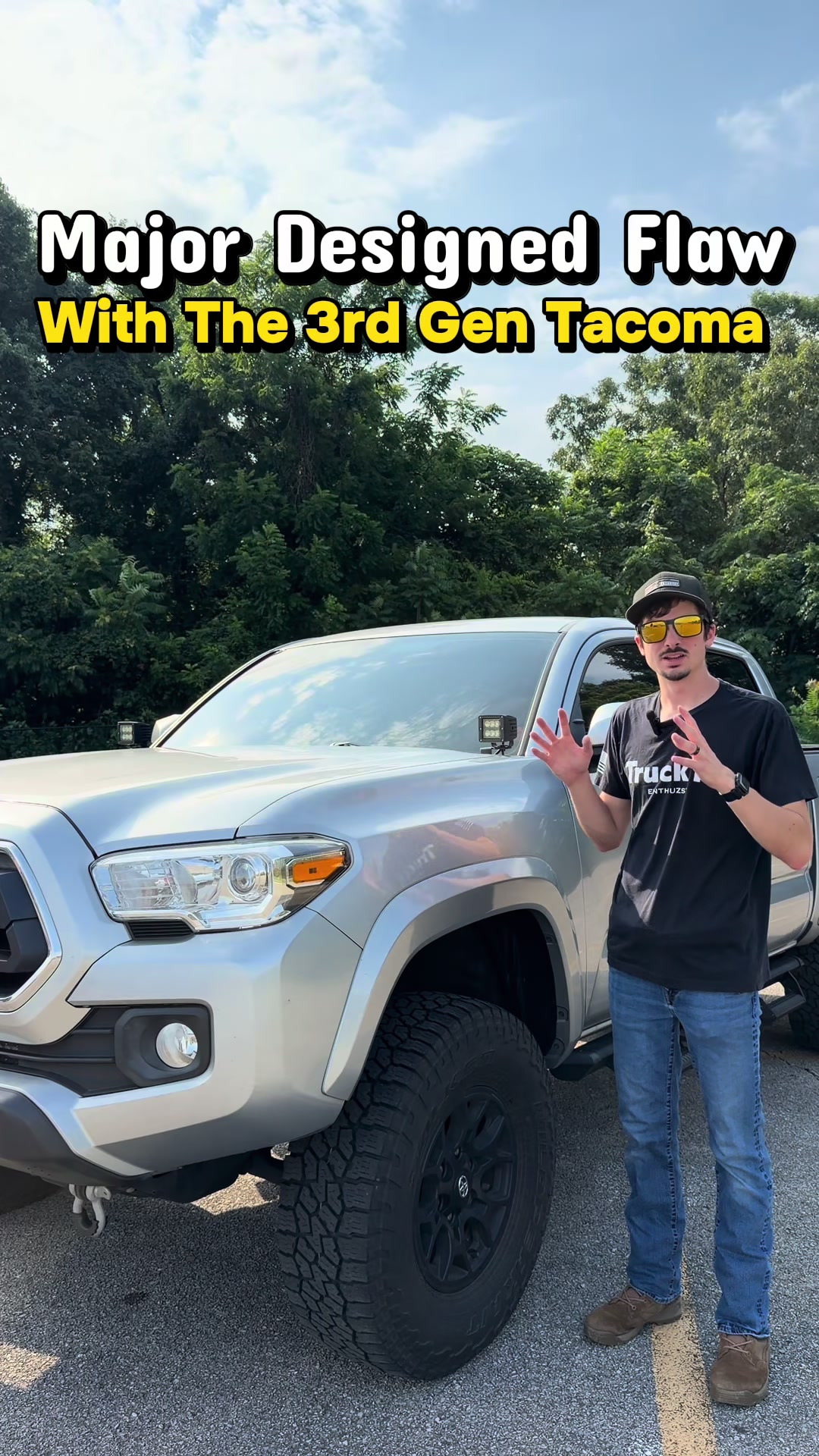 TikTok post by @trucksandwater for WolfBox. Caption reads: [...] flaw for the 2016-2023 Toyota Tacoma!....