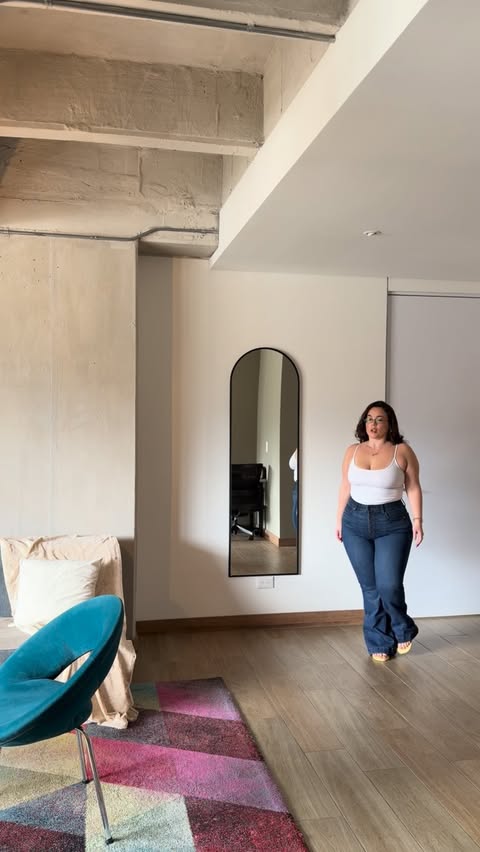 Instagram post by @thankulexx for Torrid. Caption reads: & its @thankulexx in her @torrid bombshell denim....