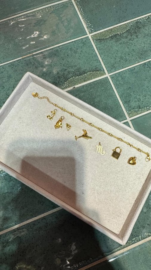 Instagram post by @venesa.bakreska for upandarmed. Caption reads: [...] me to make a custom charm bracelet at....