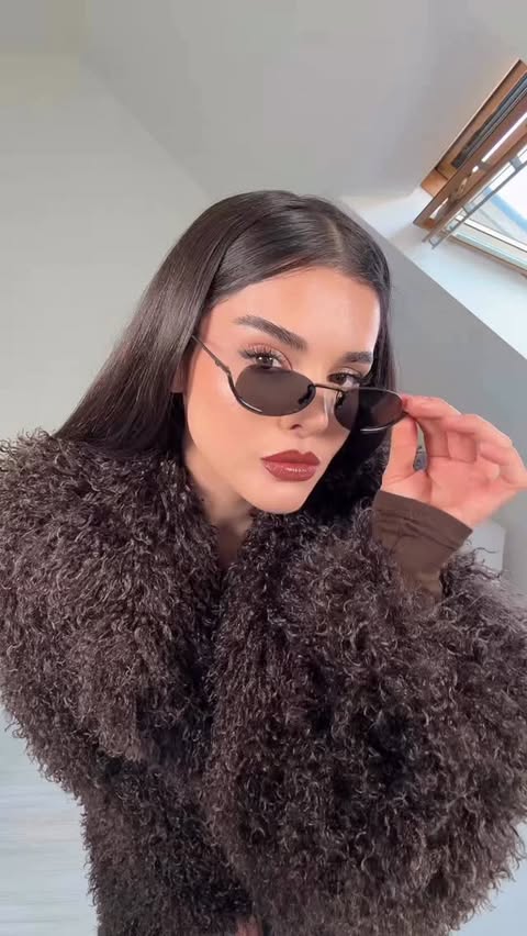 Instagram post by @ruya for WEAT. Caption reads: [...] Faux Fur Coat @prettylittlething Bag @weat....