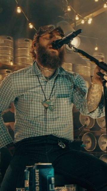 Instagram post by @postmalone for Bud Light. Caption reads: Yours with @budlight 🍻.