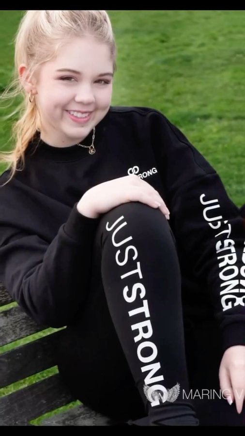 Instagram post by @katiepar_10 for Just Strong. Caption reads: “Strength and beauty are like two sides of the....