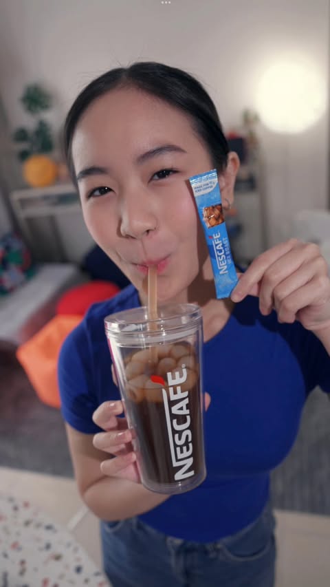 Instagram post by @capcaprice for NESCAFÉ Philippines. Caption reads: Just found my new go-to iced coffee. Can’t wait....
