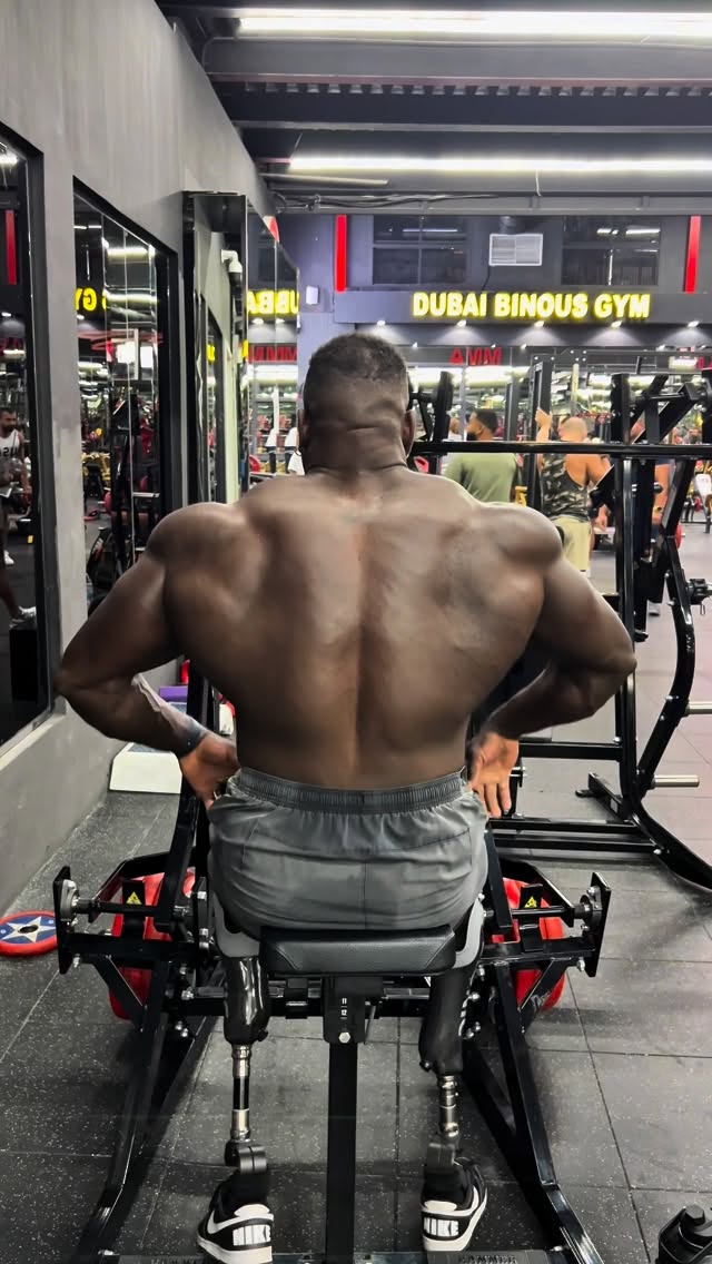 Instagram post by @bionic_body for boohooMAN. Caption reads: Strong back. Unbreakable soul !.