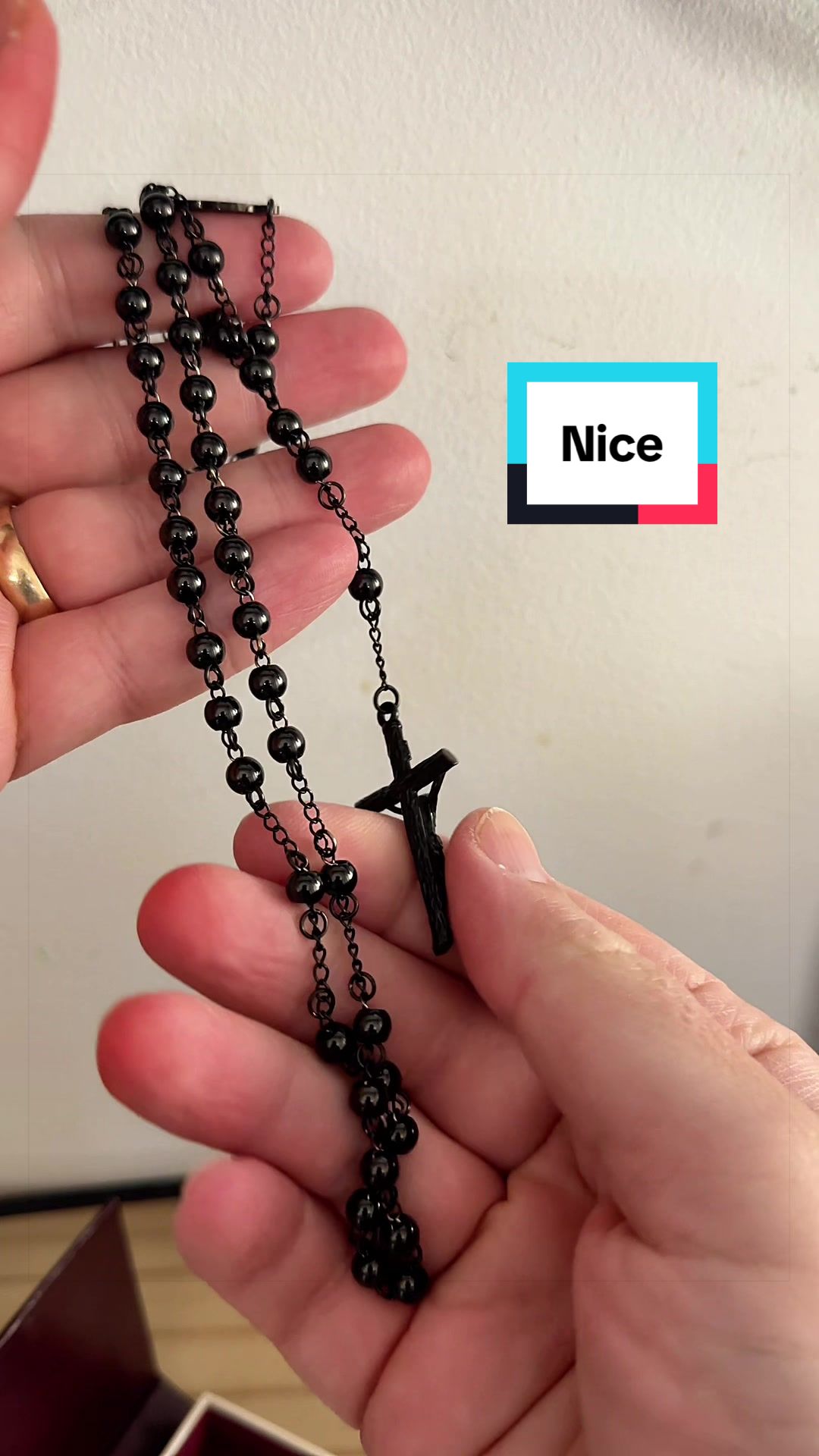 TikTok post by @bargainbashersrc for FaithHeart Jewelry. Caption reads: This rosary from @FaithHeart Jewelry comes in a....