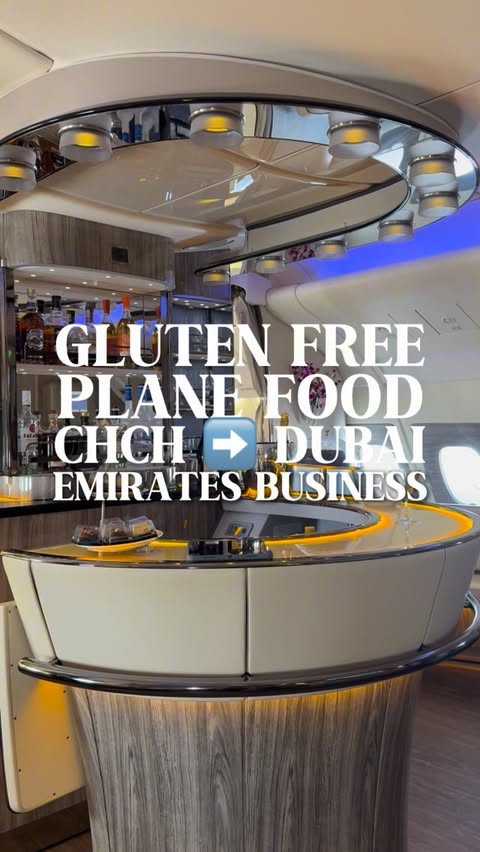 Instagram post by @howtocoeliac for Emirates. Caption reads: ✨Gluten Free Plane Food: Emirates Business....