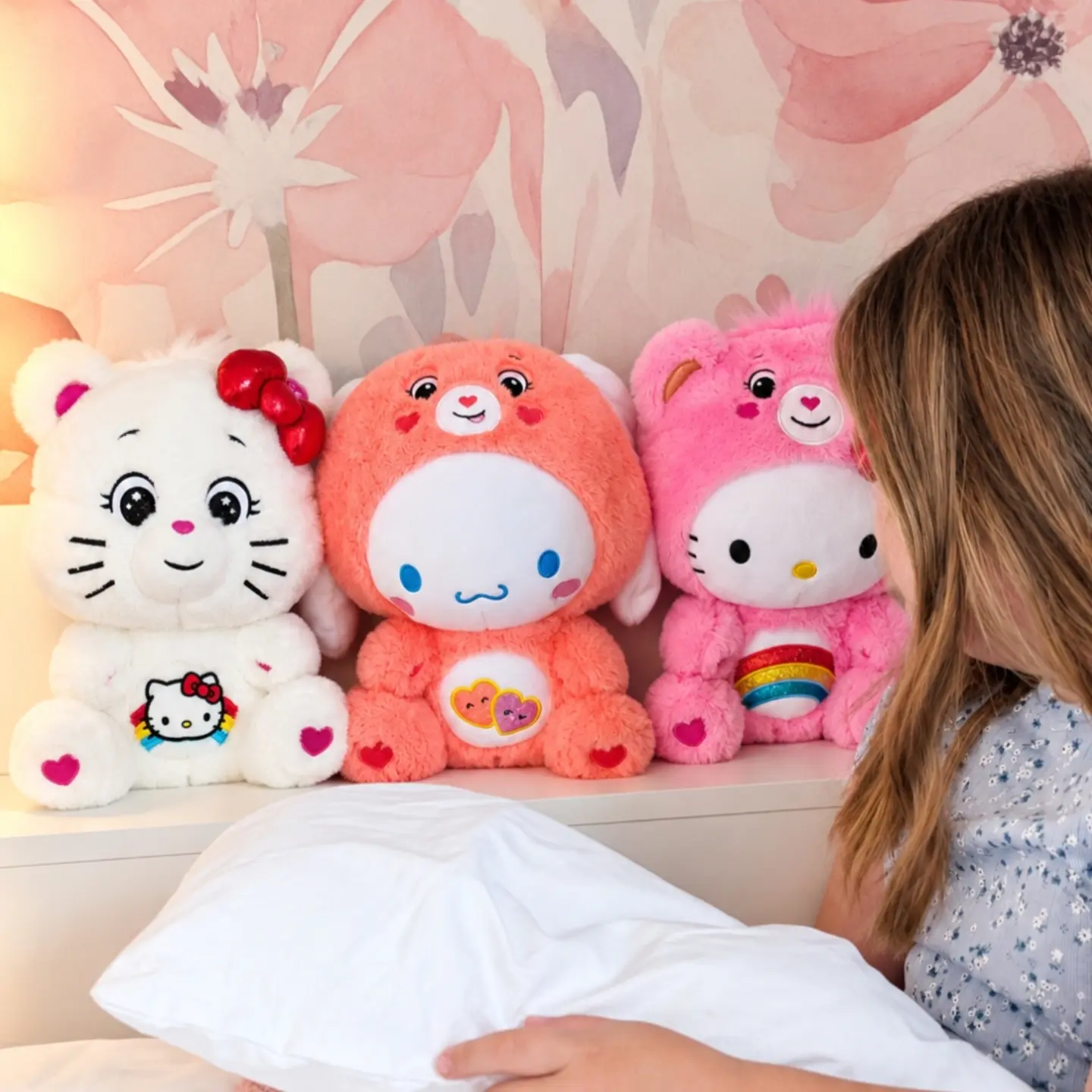 Instagram post by @_the_watts_family for Care Bears. Caption reads: [...] Maisie is OBSESSED with these Care Bears x....