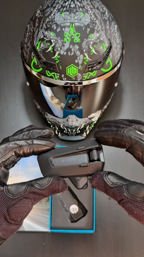 Instagram post by @motto_juice for Cardo Systems. Caption reads: [...] helmet setup doesn’t exi 💚🖤 @cardosystems....