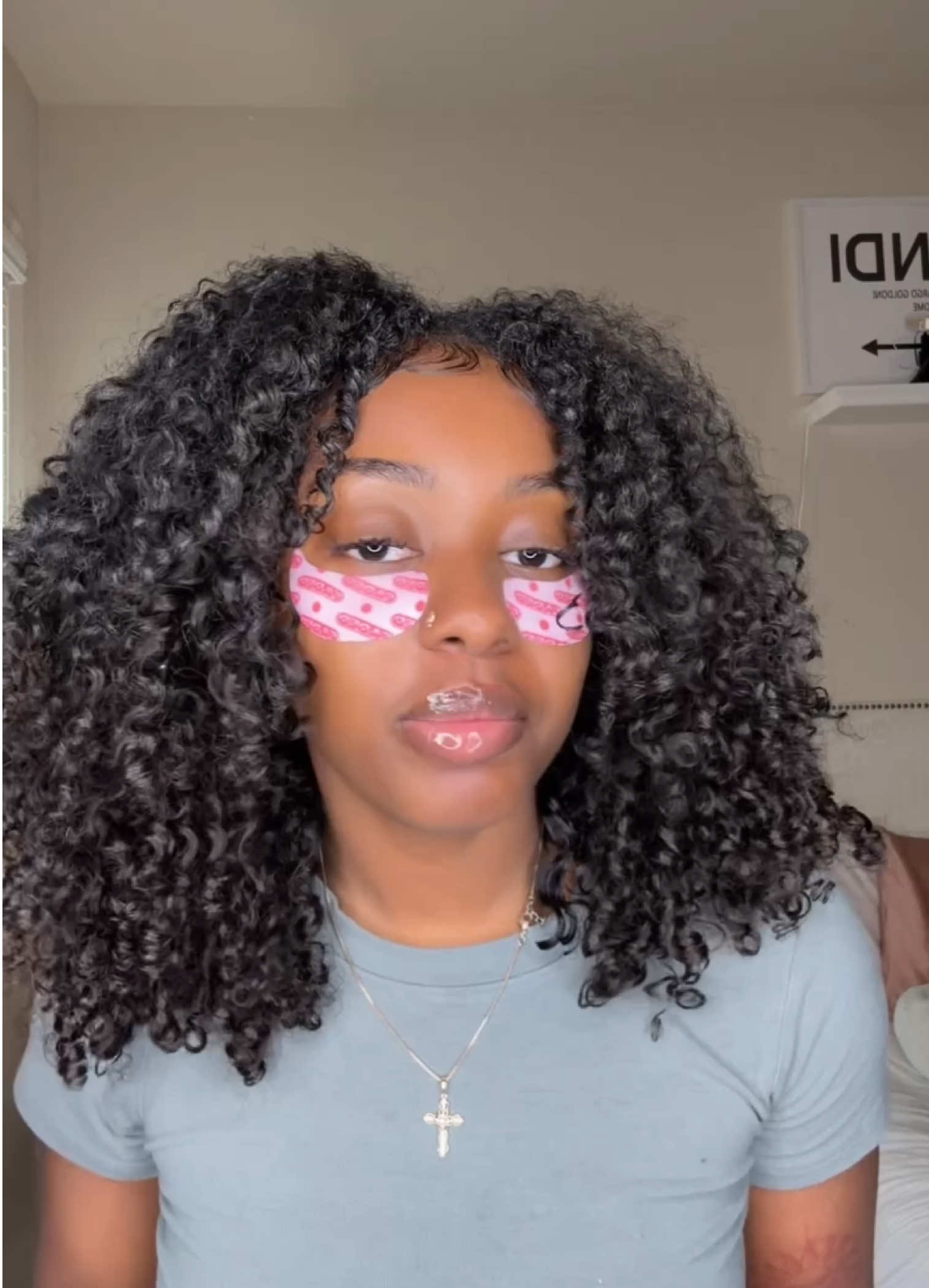 TikTok post by @tianashannell for Wavymy Hair. Caption reads: When I say I love me a curly  v part or half wig....