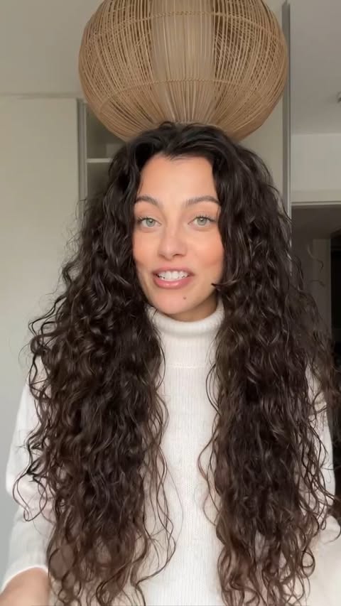 Instagram post by @courtney__flowers for Hairlust. Caption reads: *ad curly hair refresh routine with @hairlust for....