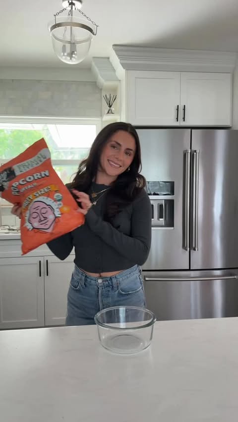 Instagram post by @lillyybearrr for LesserEvil Snacks. Caption reads: [...] up my favorite hot snacks from....