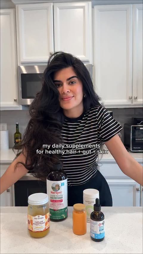 Instagram post by @seetorra for Nutrafol. Caption reads: My daily supplements for long hair and glass skin....