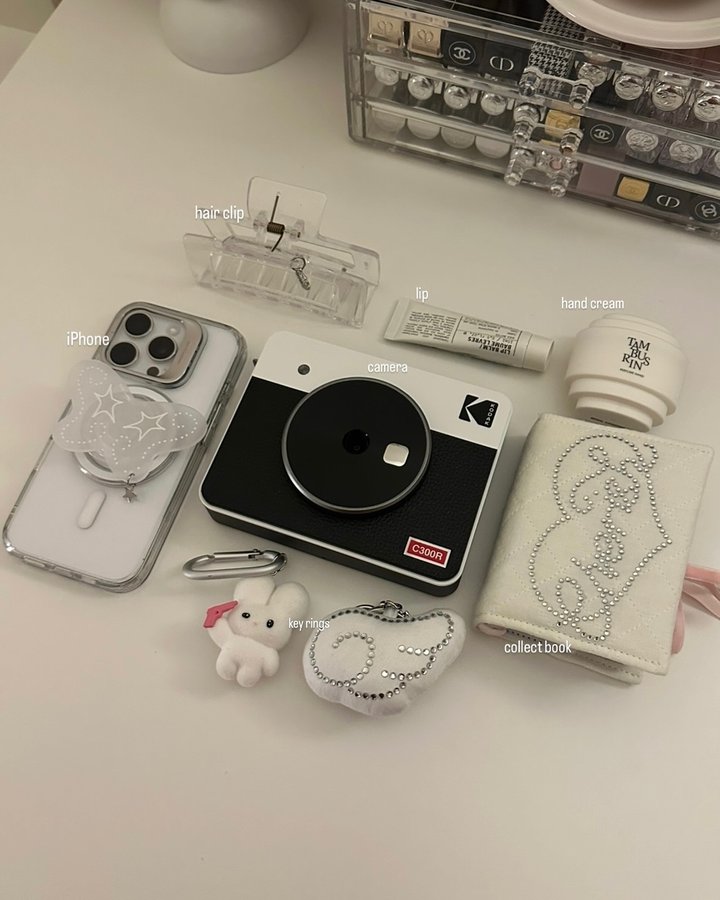 Instagram post by @__midnight96__ for Kodak Photo Printer. Caption reads: in my bag 🎀
最近ゲットした @kodakphotoprinter_jp....