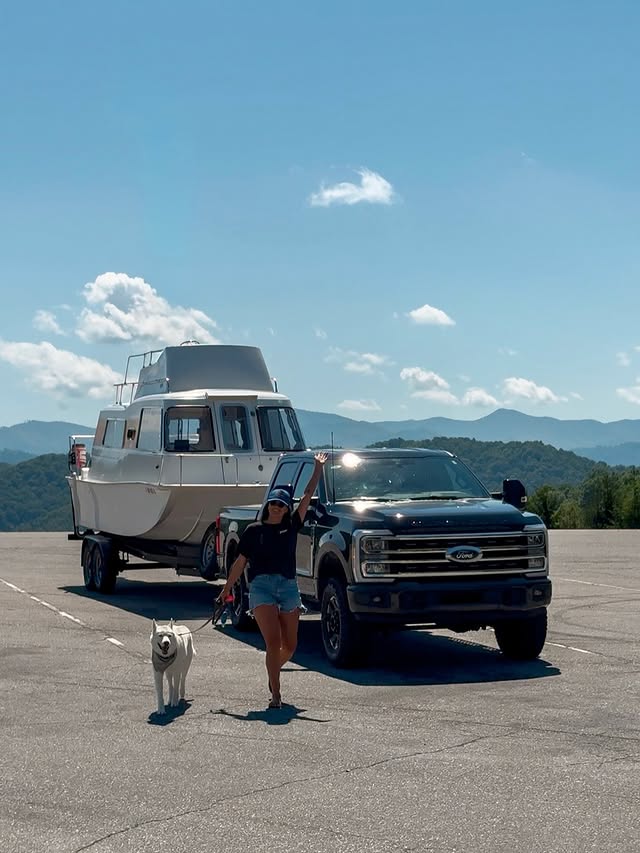 Instagram post by @slowcarfasthome for Ford. Caption reads: #Ford_Ambassador 2,500 miles of towing the boat....