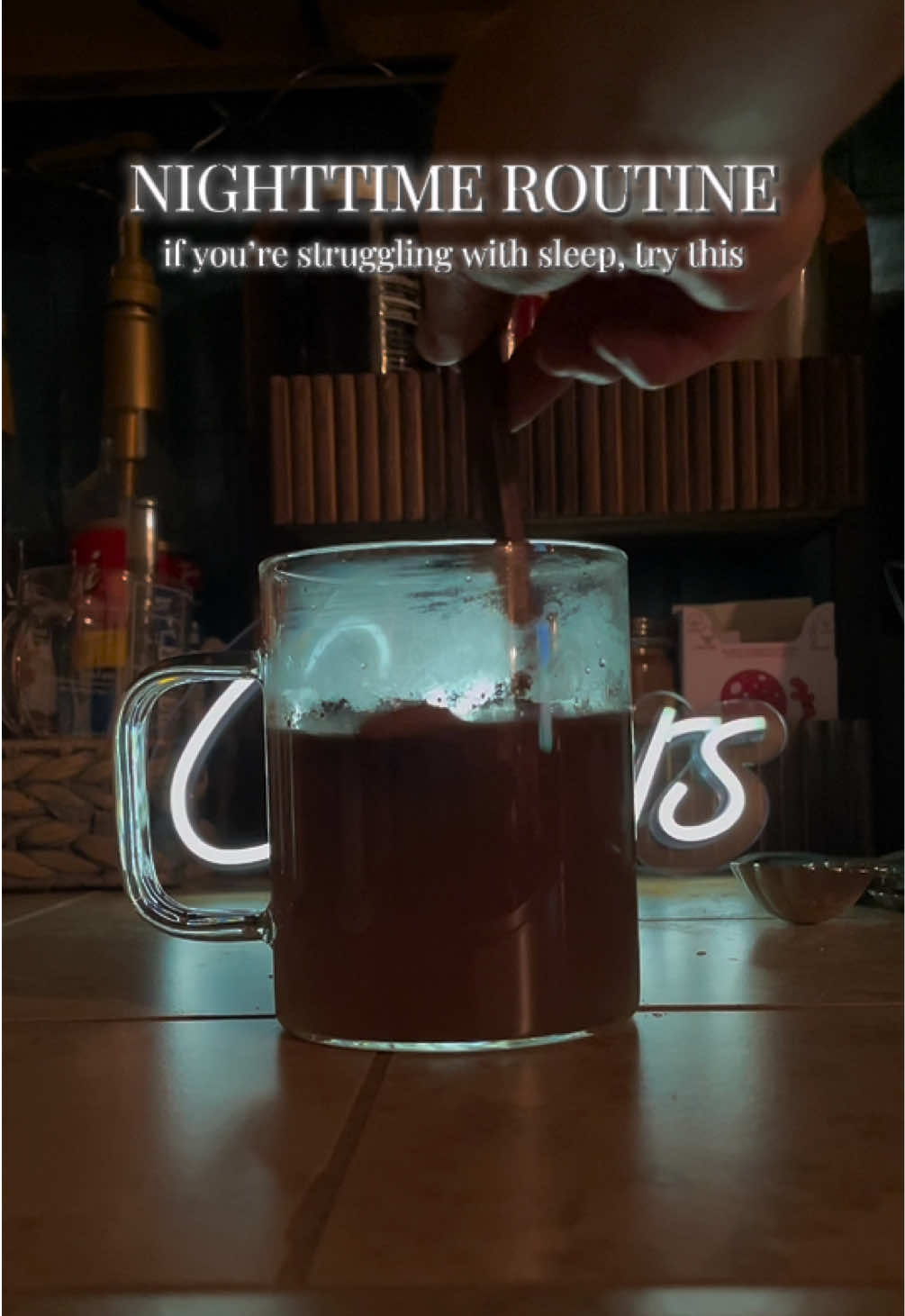 TikTok post by @lasirena_handmade for MoonBrew. Caption reads: [...] of skincare, a good book, & my @MoonBrew hot....