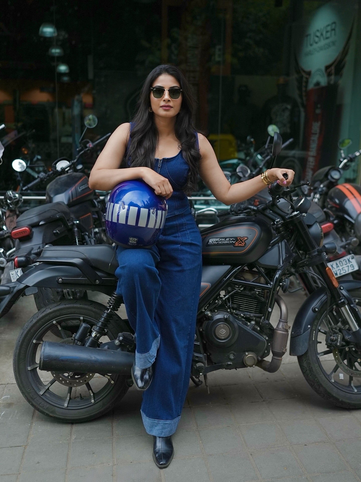 Instagram post by @kavyashettyofficial for Harley-Davidson. Caption reads: Visited the Harley-Davidson Tusker store at....