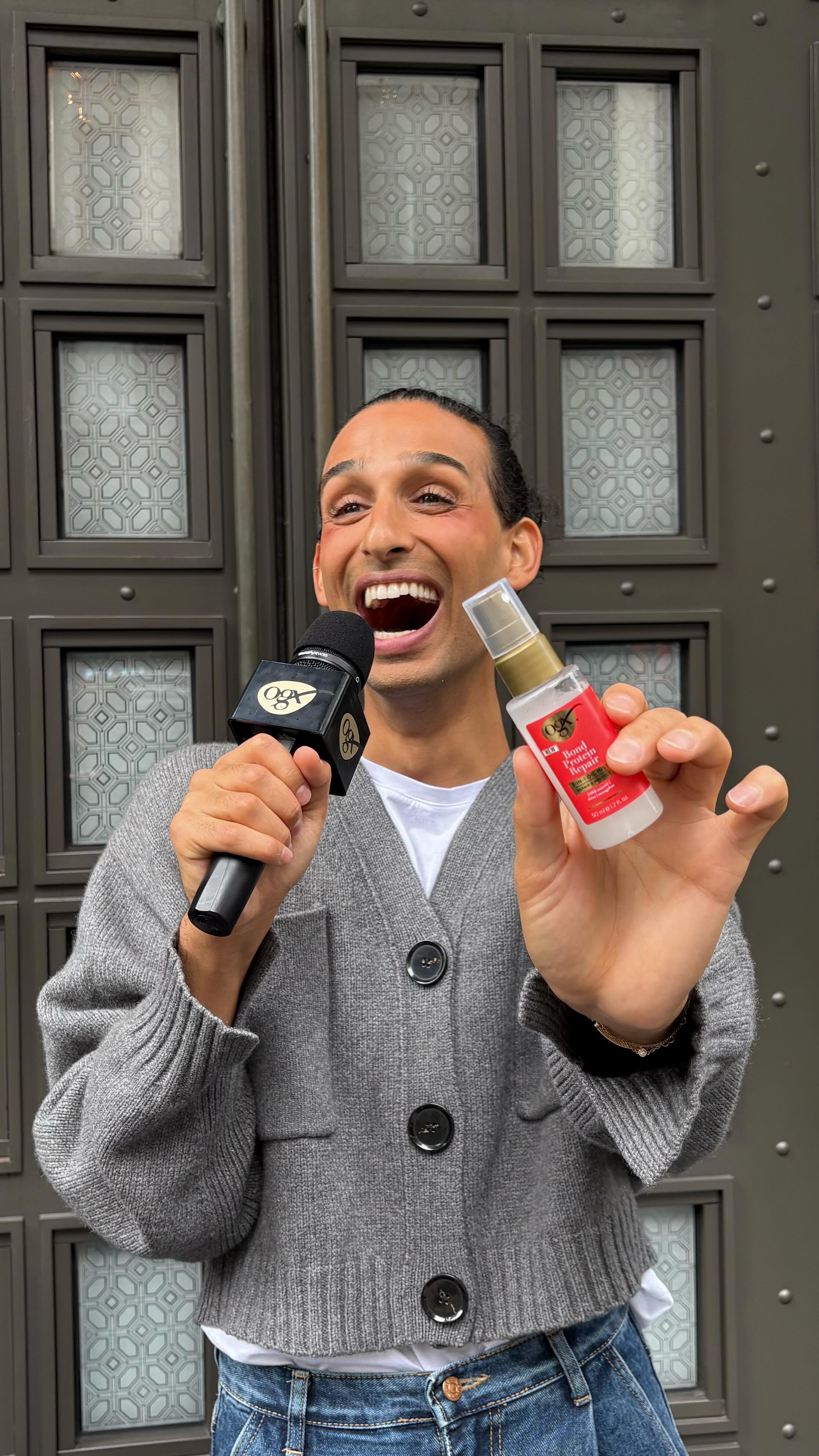 Instagram post by @cyrusveyssi for OGX Beauty. Caption reads: Long lines in NYC? Inevitable. Frizzy hair?....