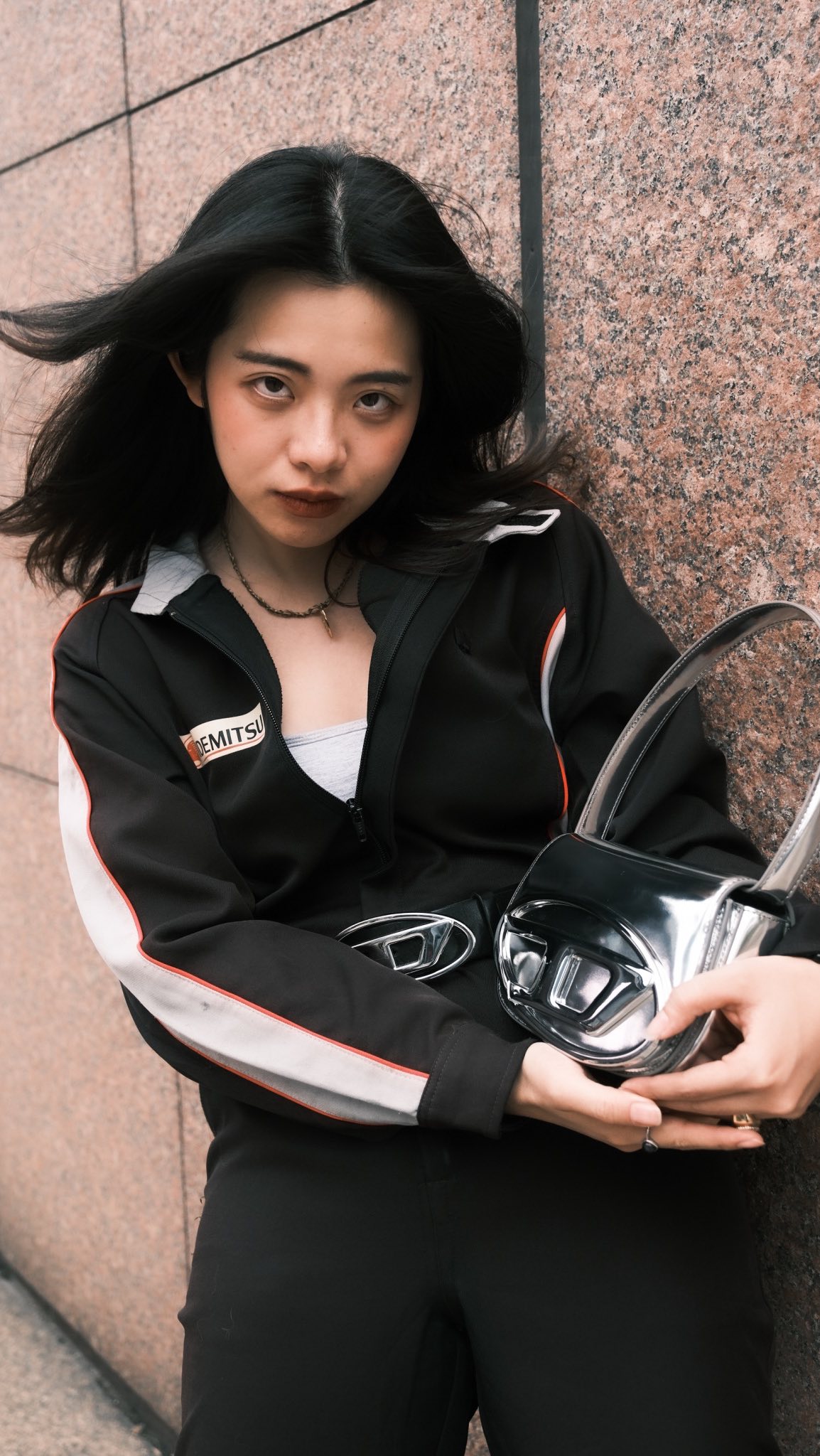 Instagram post by @milktea_drink_it for Diesel. Caption reads: New bag, new reel🔥 @diesel
.
.
.
.
📹 @fotoboii....