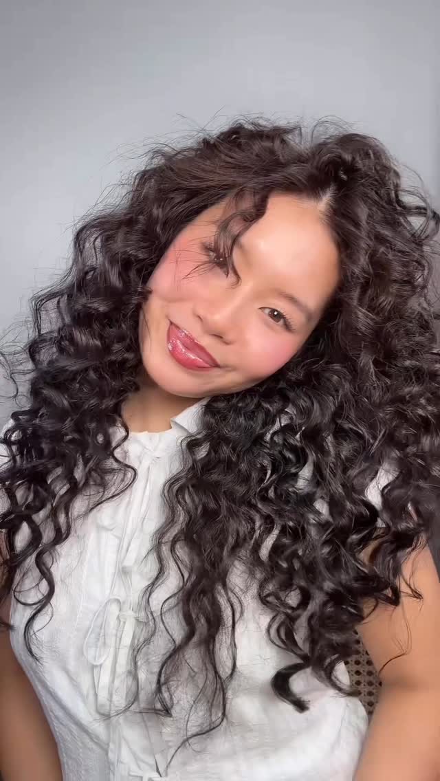 Instagram post by @morveskim for BaByliss. Caption reads: Rate this hair from 1-10 💜 hair curler @babyliss....