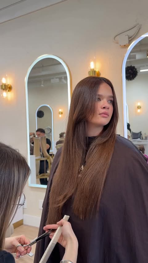 Instagram post by @glam_by_mel for Wella Professionals. Caption reads: Truly always leave with the best color & cuts 🥹🤎....