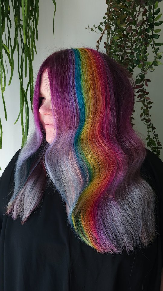 Instagram post by @jaymz.marsters for Biolage. Caption reads: Save this rainbow hair inspiration 🌈

Lifted up a....