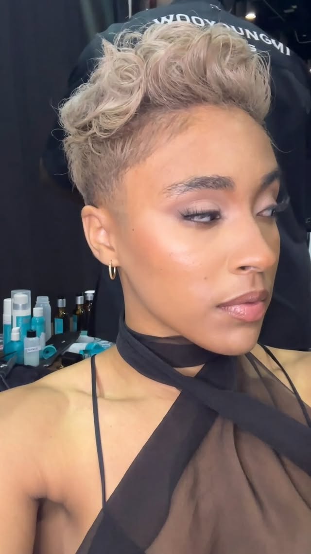 Instagram post by @greg_gilmore for Moroccanoil. Caption reads: Black to Blonde using @moroccanoilpro Blonde....