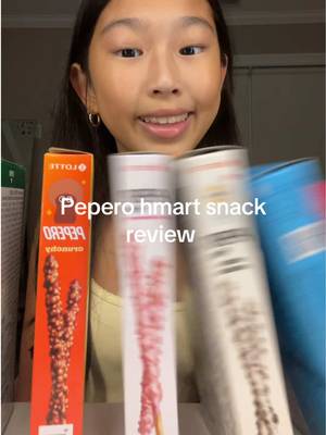 TikTok post by @elizabetheatzz for Bimbo Promotion. Caption reads: Tasting and ranking every flavor of PEPERO Korean....