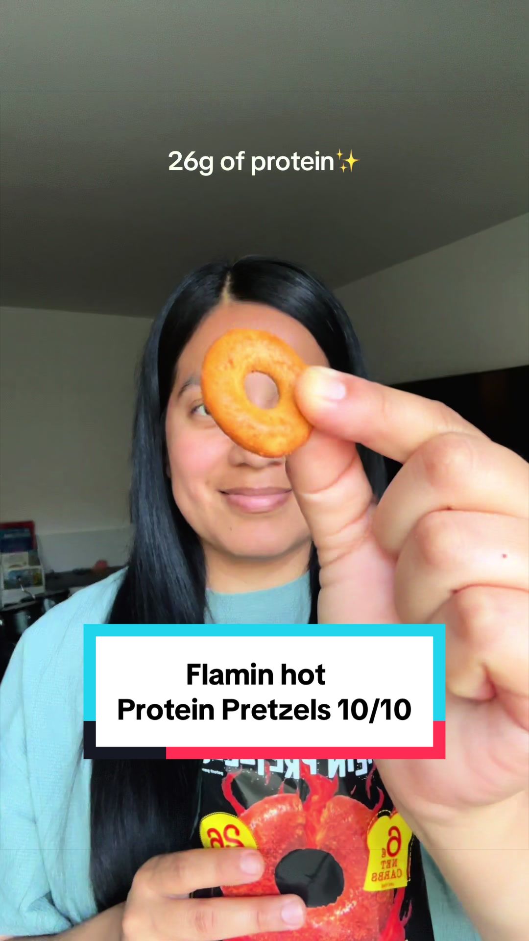 TikTok post by @adakalas for Crisp Power. Caption reads: Flamin crunch protein pretzels by @Crisp Power are....