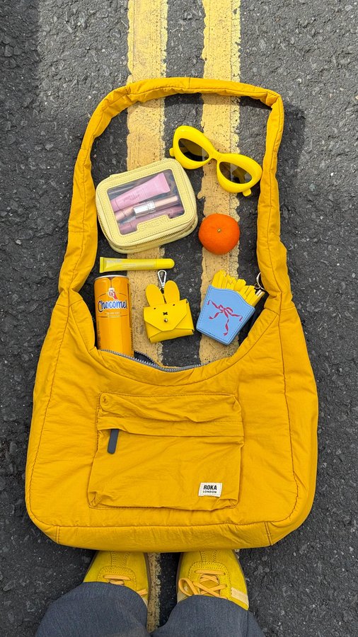 Instagram post by @styled.daisy for ROKA London. Caption reads: ad | The bag that carries it all, in every colour....